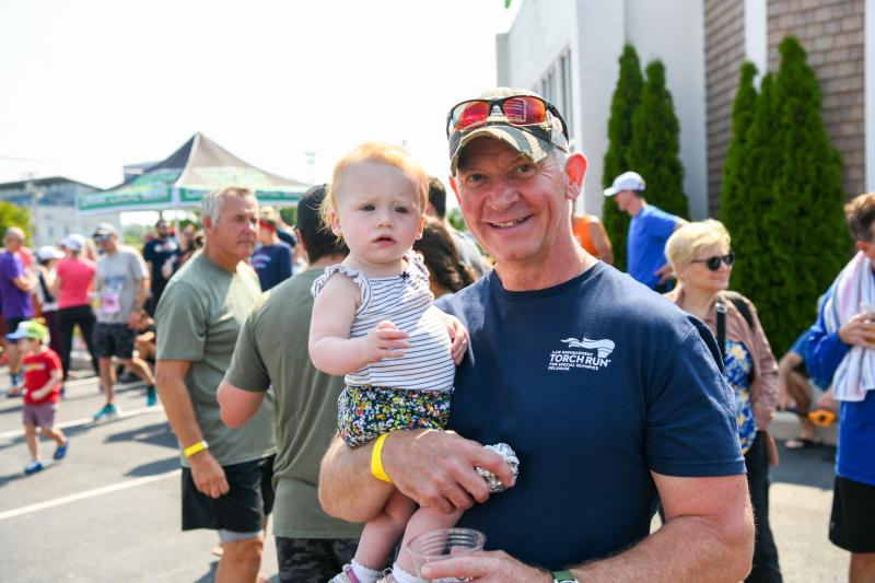 Robert Coupe, aka grandpa Buck, with granddaughter Kinsley. DAVE FREDERICK PHOTOS